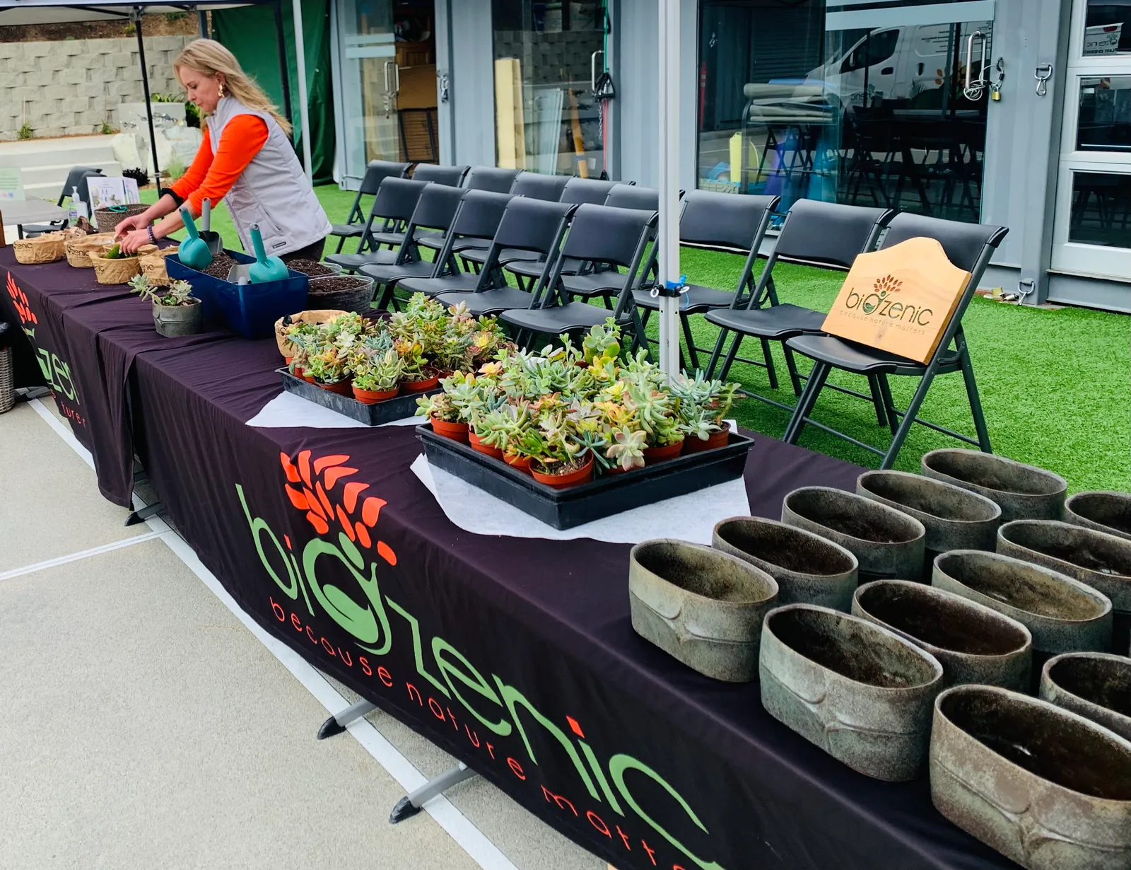 A Biozenic workshop table set with plants, pots and trays